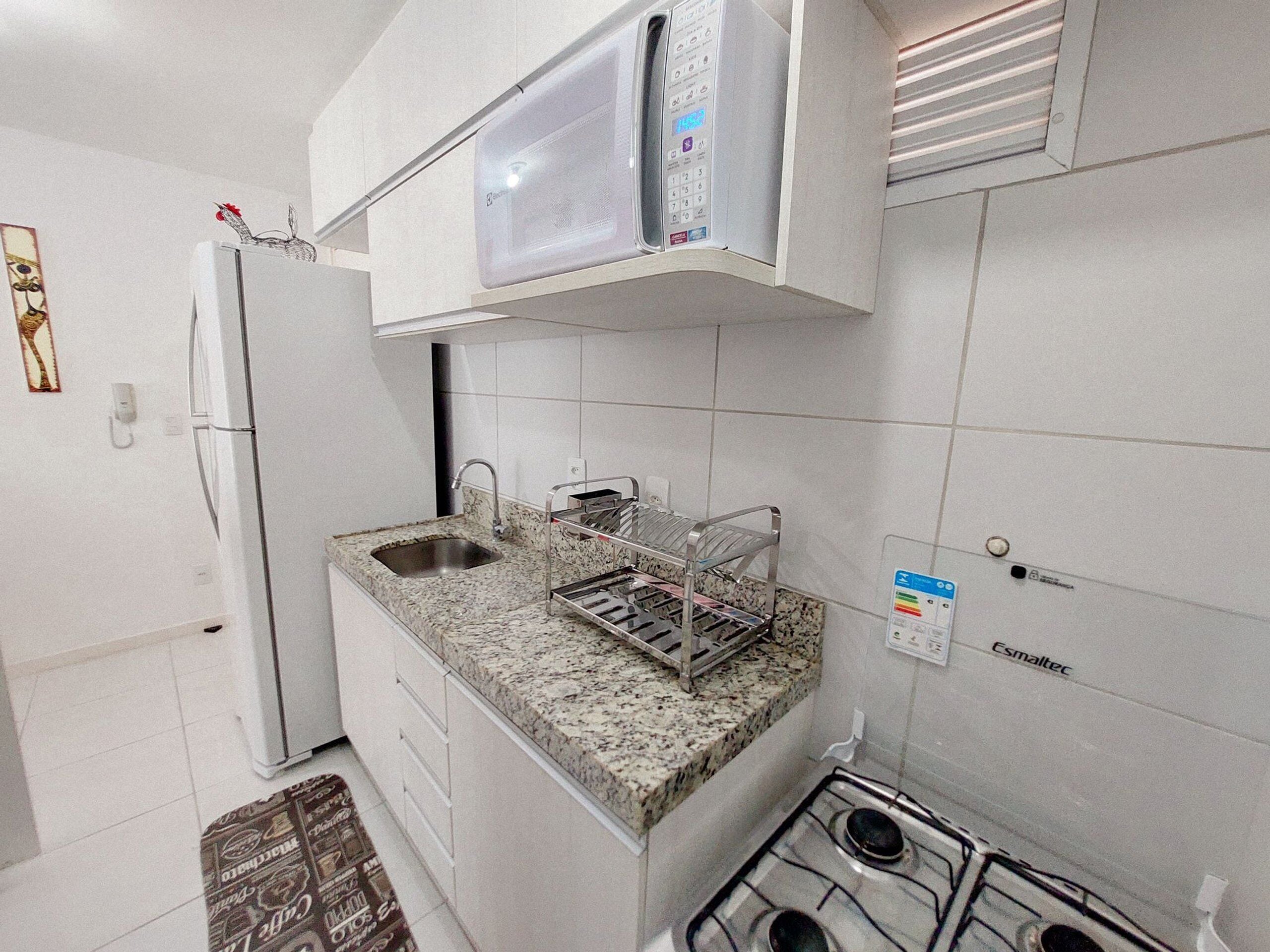 Familieleilighet, hageutsikt | Eget kjøkken | Kjøleskap, mikrobølgeovn og kjøkkenutstyr