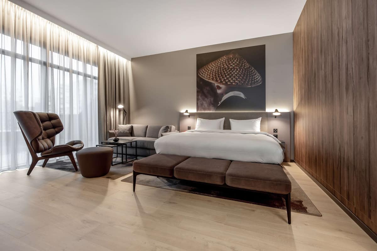 junior suite, terrace | in-room safe, desk, iron/ironing board, free wifi