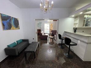 ATHENA | Living area | 32-inch Smart TV with satellite channels, TV