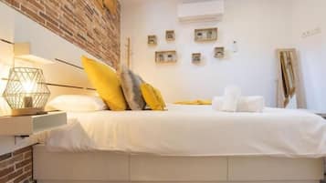 1 dormitorio, tabla de planchar con plancha, Internet y ropa de cama