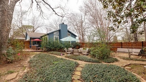 A backyard with a patio, a wooden deck, and a garden path. - Amazing! ATnT Stadium Rangers New Ball Park, Six Flags, Hurricane Harb Tex Live! (Arlington)