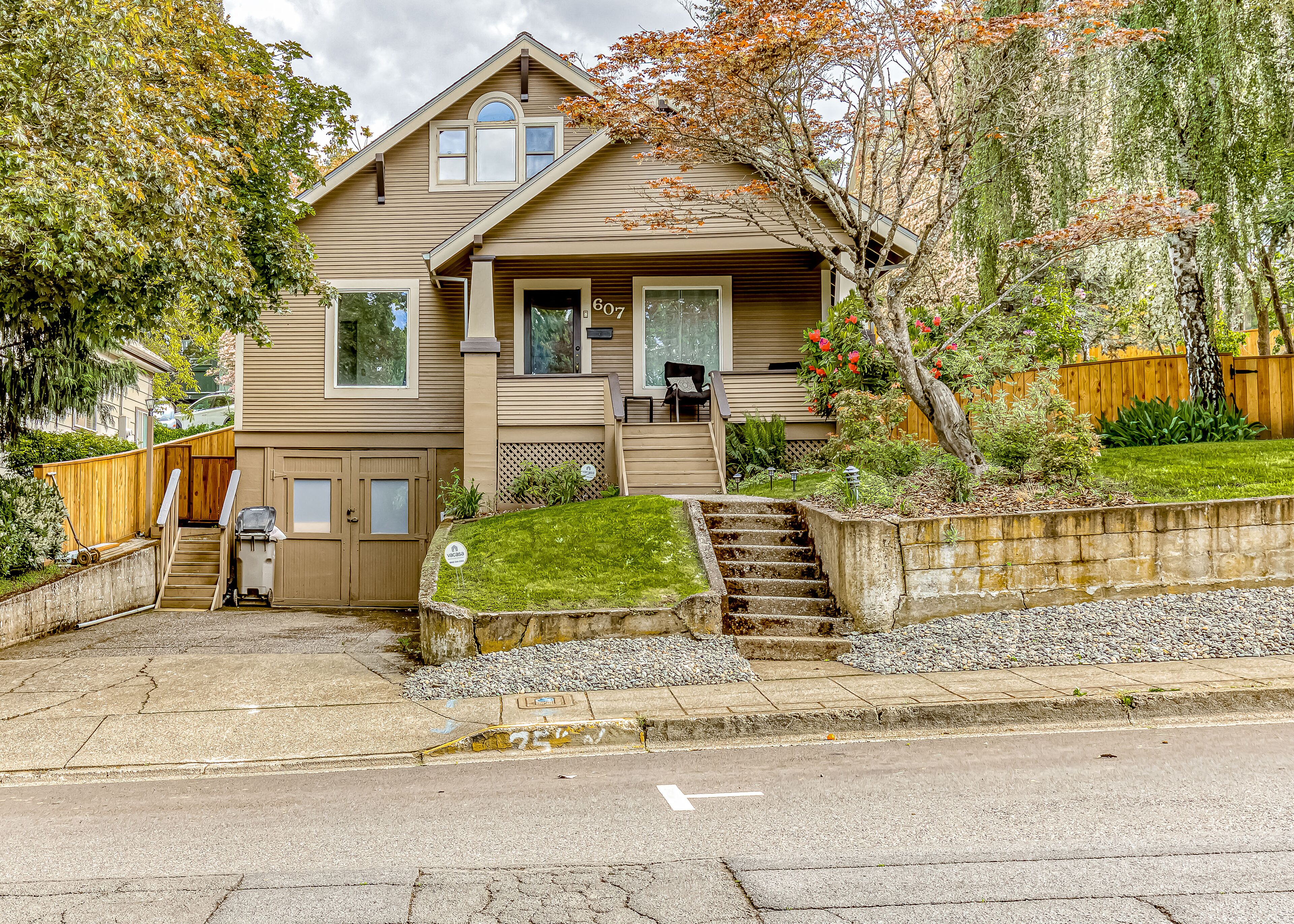 Stylish home, loft, & guest suite with hot tub, fenced yard, WiFi, & W/D