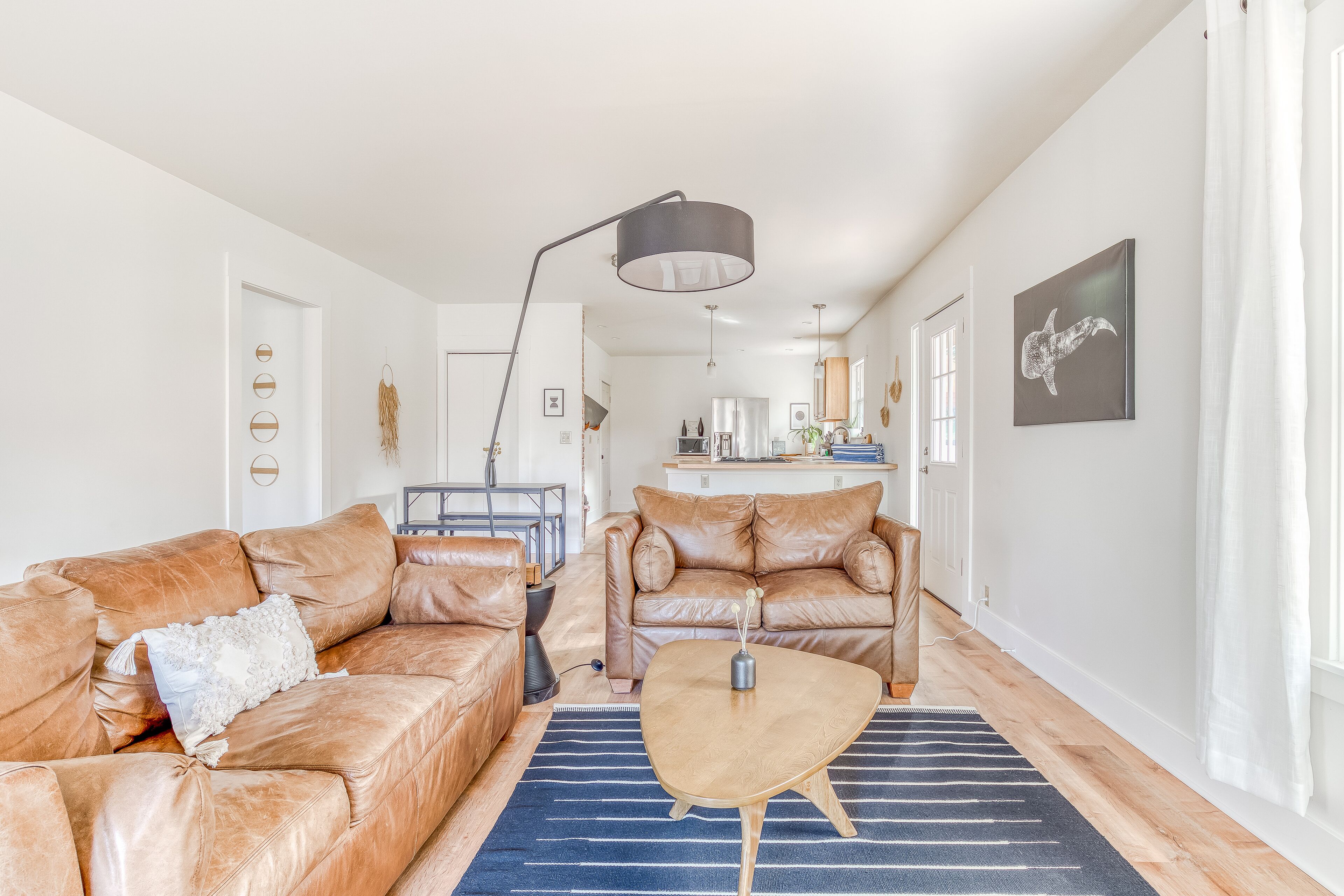 Stylish home, loft, & guest suite with hot tub, fenced yard, WiFi, & W/D