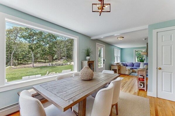 Dining - Updated home with forest views, deck, firepit, fast WiFi - near town/beaches (Oak Bluffs)