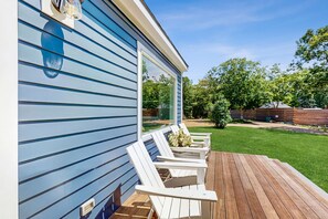 Terrace/patio - Updated home with forest views, deck, firepit, fast WiFi - near town/beaches (Oak Bluffs)