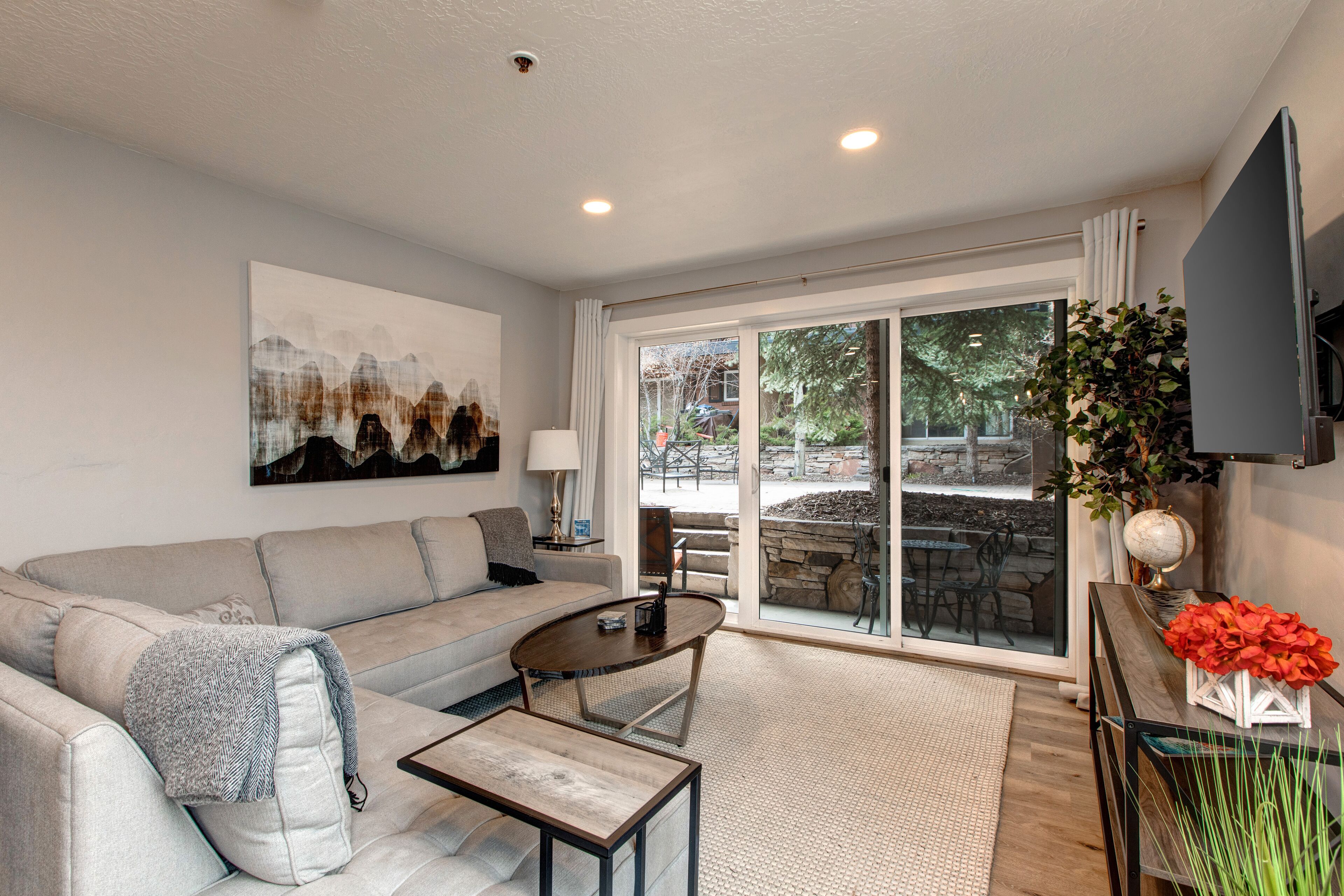 Modern condo with Main Street location, on-site dining, firepit, & hot tub