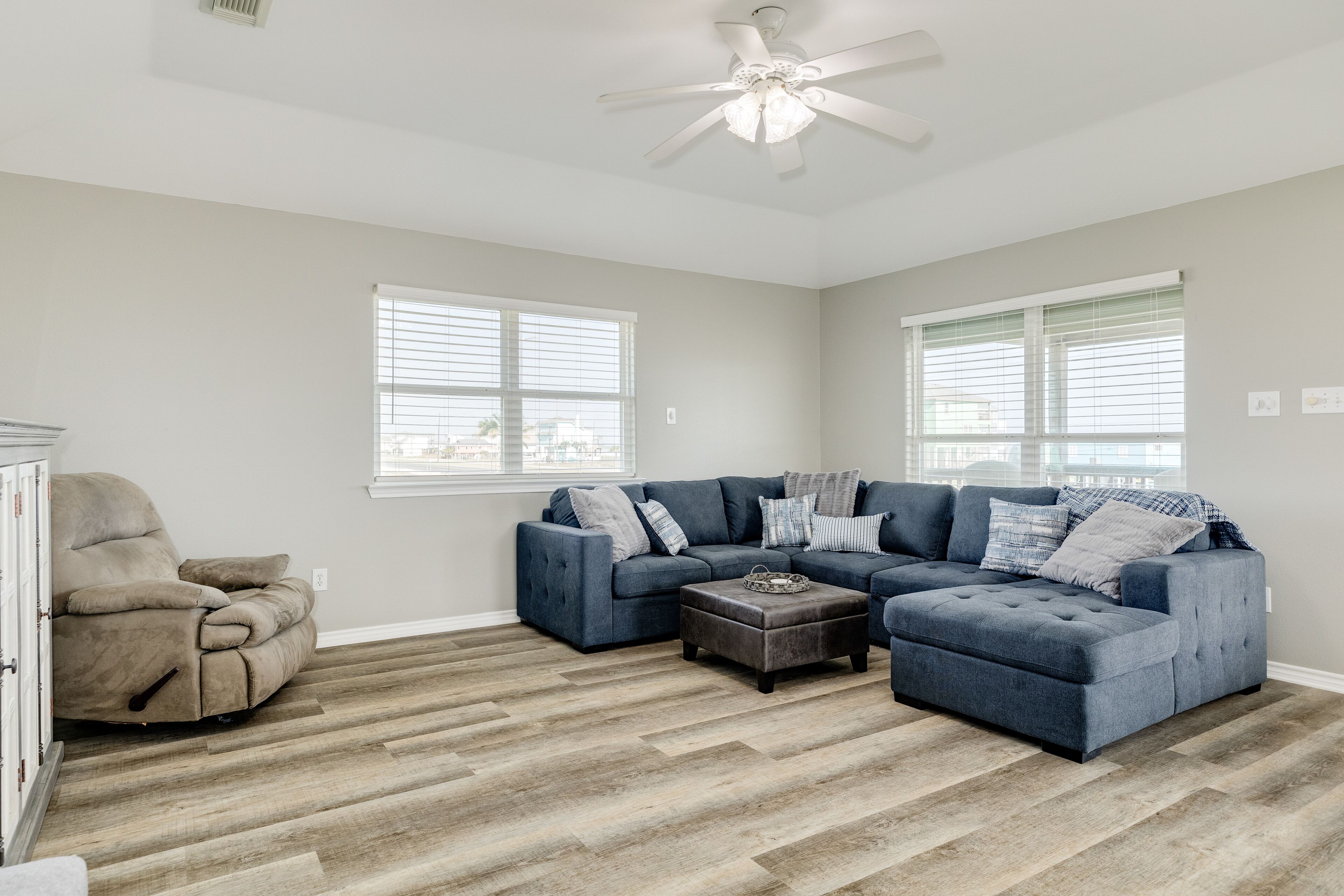 Water-view home steps from the beach - central AC, washer/dryer, & shared pool