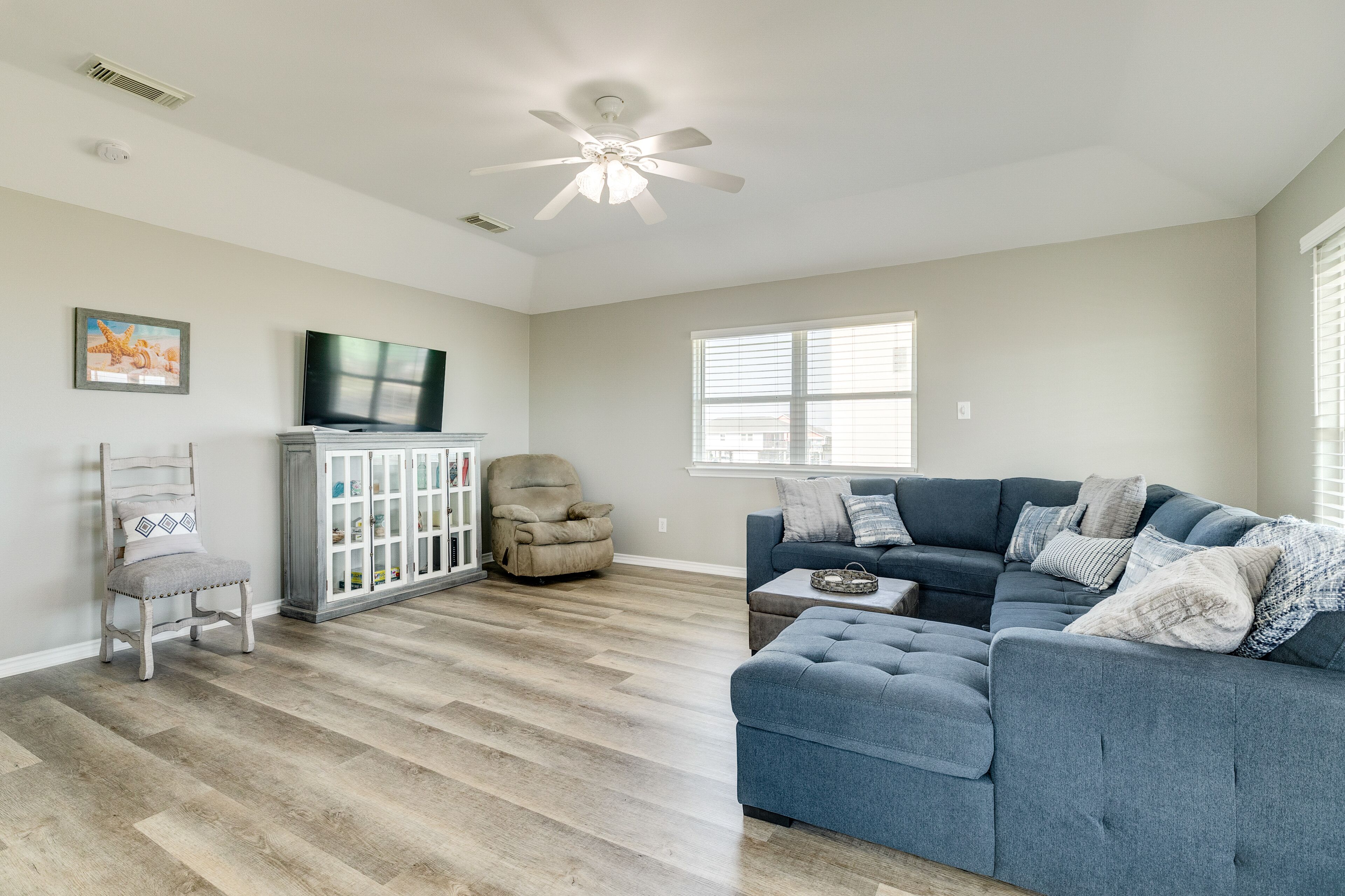 Water-view home steps from the beach - central AC, washer/dryer, & shared pool