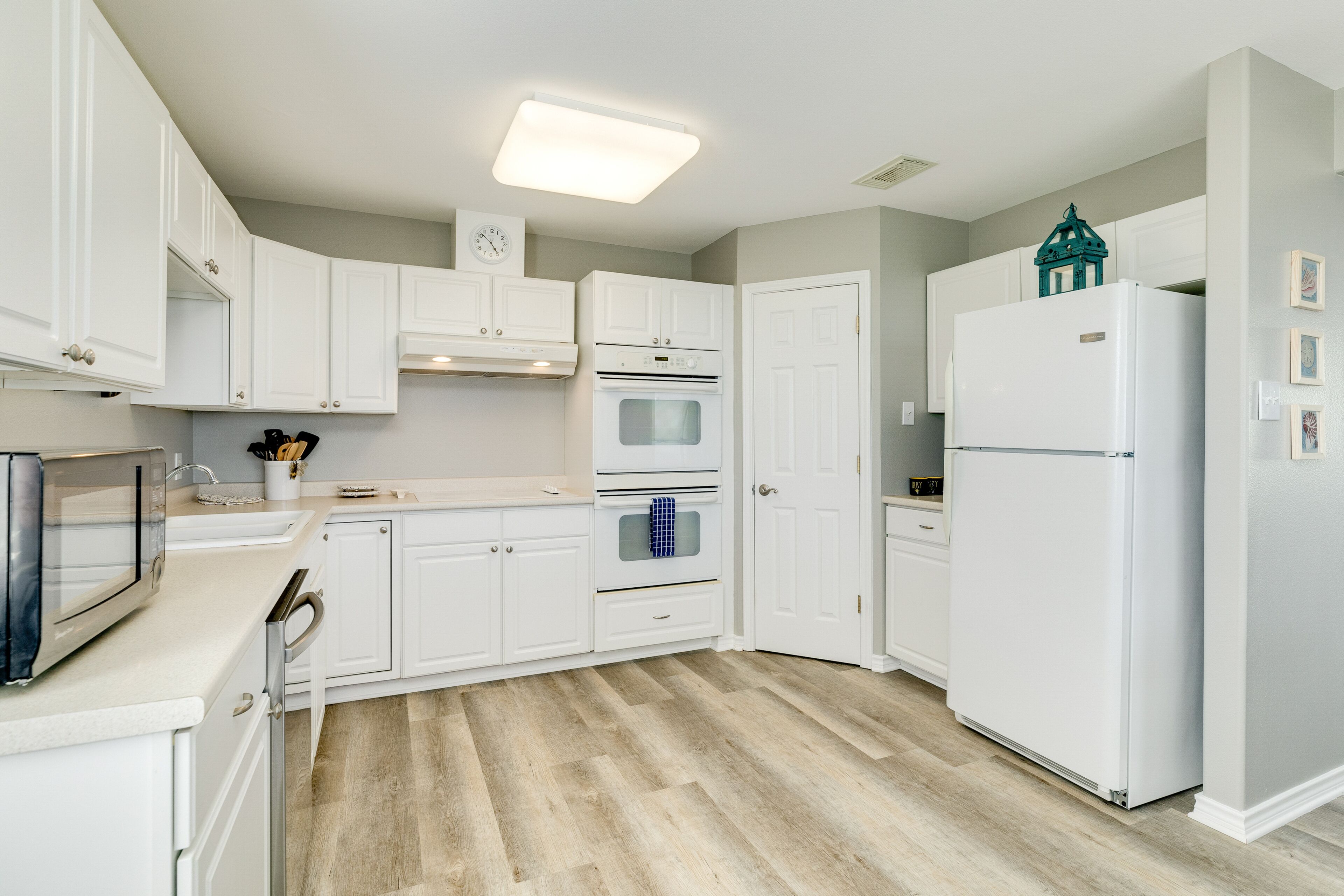 Water-view home steps from the beach - central AC, washer/dryer, & shared pool