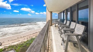 A balcony with a view of the beach and ocean. - Sea Gull #905LK: Beachfront 2 Bedroom 2 Bathroom With Spectacular Views and 24 Hour Management (Port Aransas)