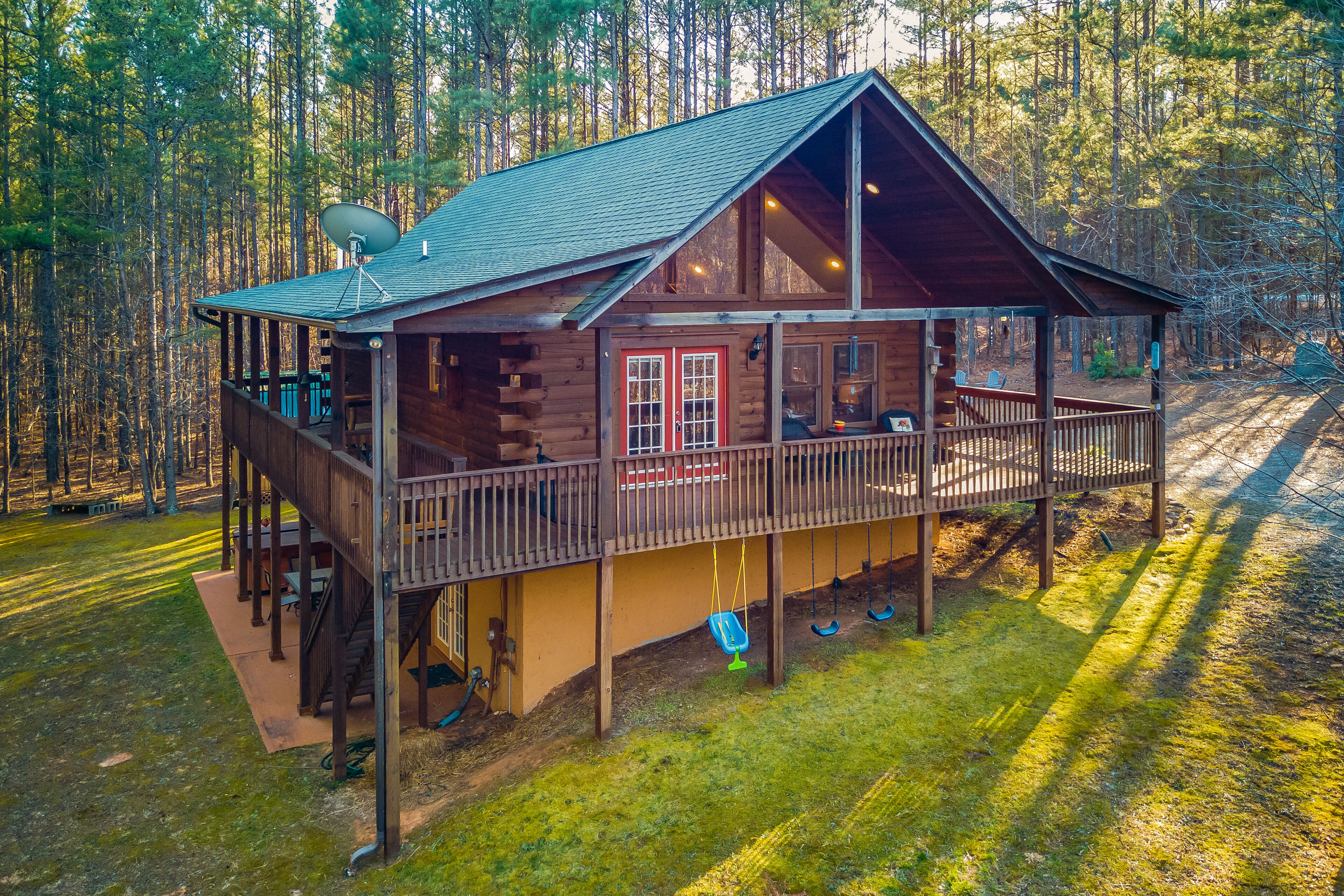 Woodsy retreat with private hot tub, game room, deck, firepit, grill, & WiFi