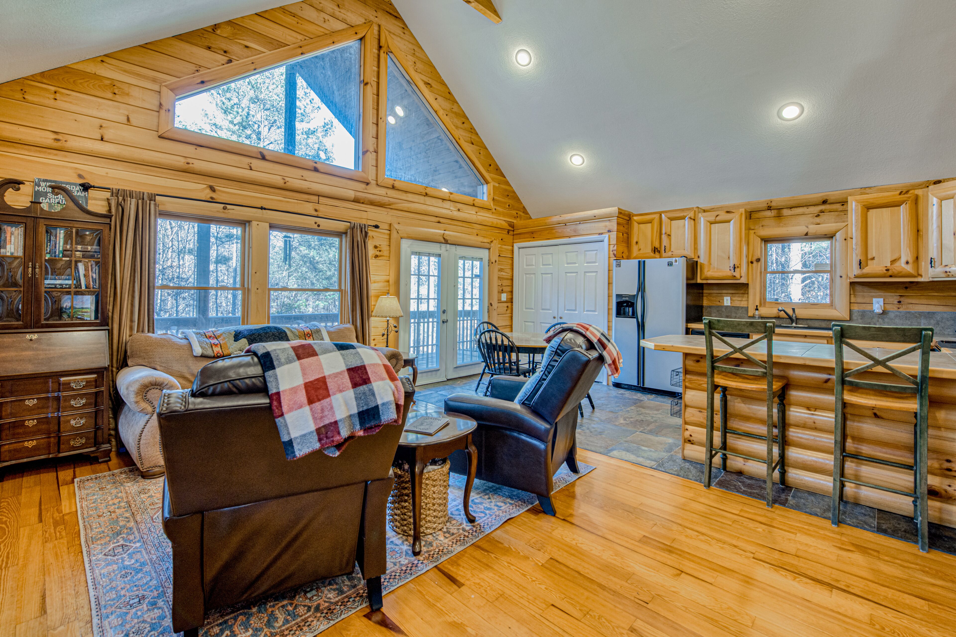 Woodsy retreat with private hot tub, game room, deck, firepit, grill, & WiFi