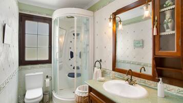 Bathtub, hair dryer, towels