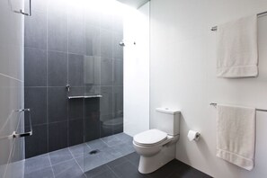 Bathtub, hair dryer, towels, soap