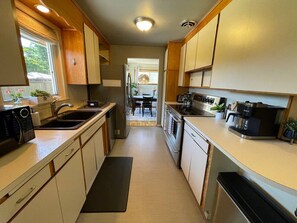 Coffee/tea maker, fridge, microwave, oven