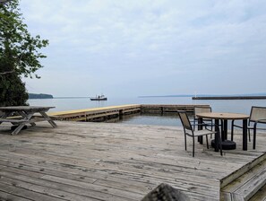 Outdoor dining - Harbor Beach House - Right on the Water, located Downtown La Pointe! (La Pointe)