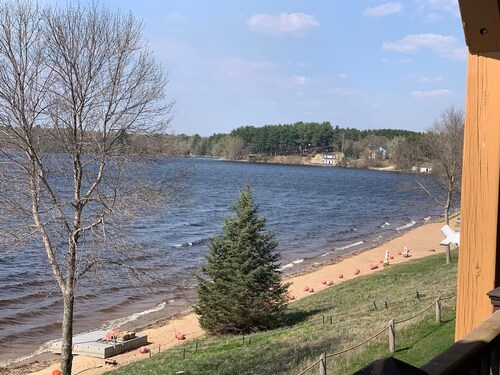 Golf Cart available! Gorgeous Golf & Lake Condo with heated pool