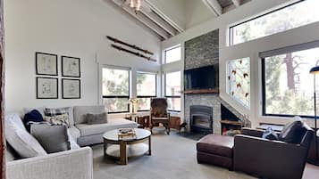 Condo, 4 Bedrooms | Living area | TV, fireplace, DVD player, table football