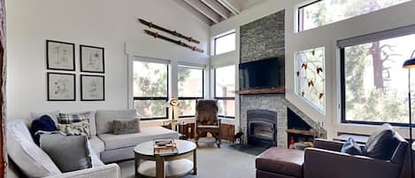 Condo, 4 Bedrooms | Living area | TV, fireplace, DVD player, table football