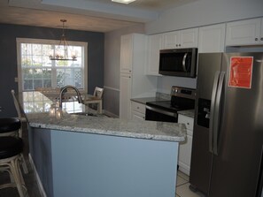 Condo, 1 Bedroom | Private kitchen | Fridge, microwave, dishwasher, coffee/tea maker