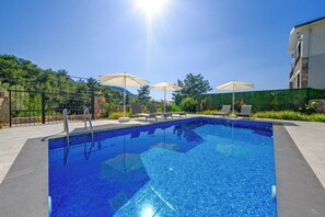 Outdoor pool, sun loungers