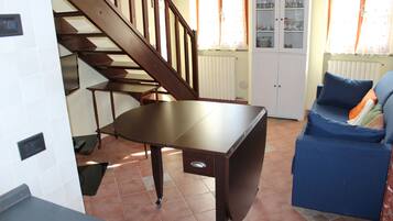 Apartment, 1 Queen Bed with Sofa bed | Living room | 30-inch TV with digital channels, fireplace