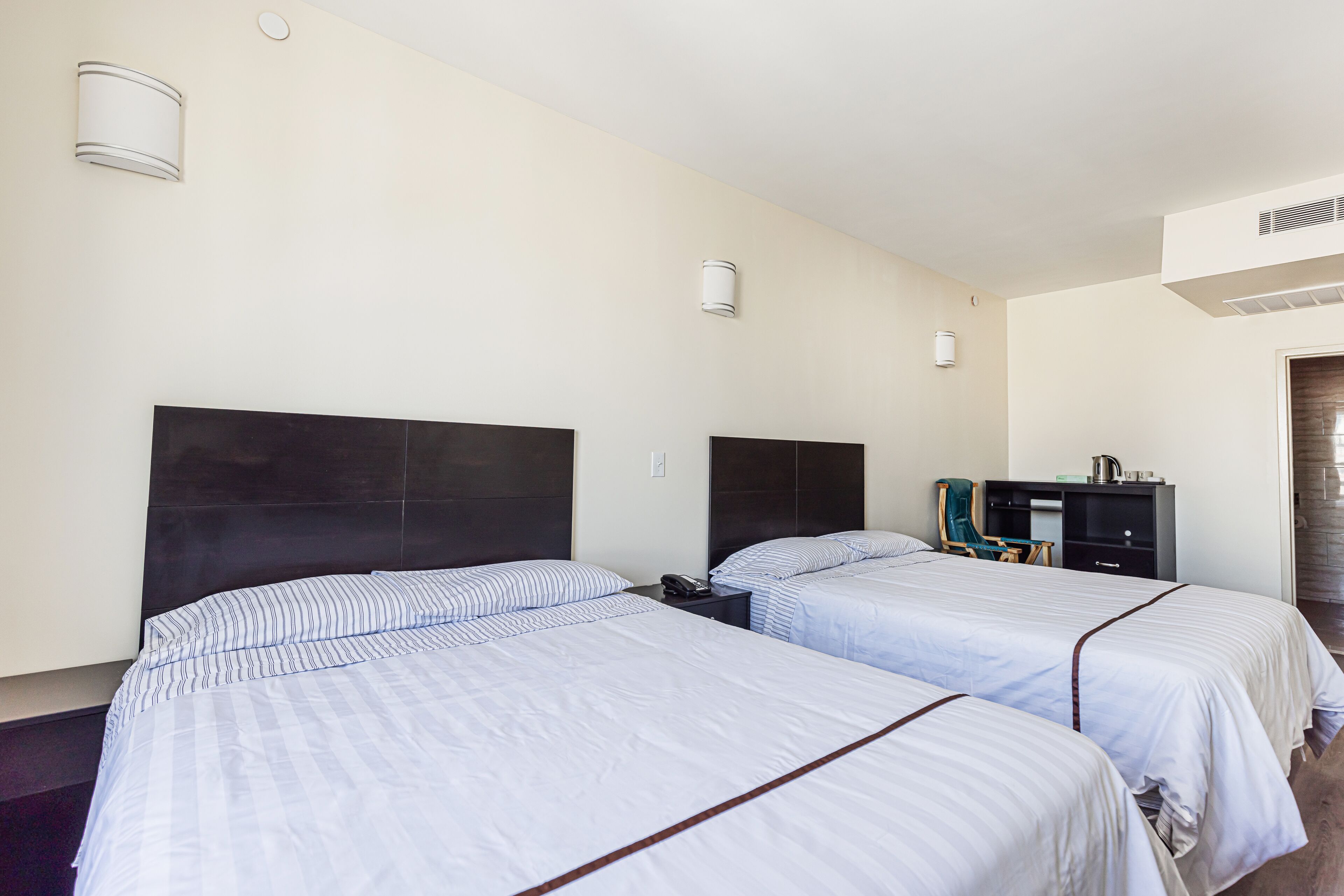 deluxe double room, 2 queen beds, non smoking | 1 bedroom, premium bedding, down duvets, memory-foam beds