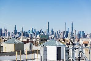 A city skyline with modern high-rise buildings.