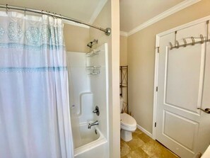 Shower, hair dryer, towels, shampoo