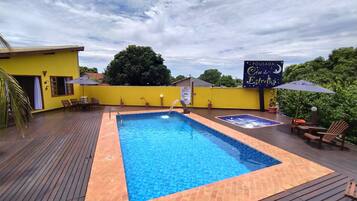 Outdoor pool, open 8:00 AM to 10:00 PM, pool umbrellas, sun loungers