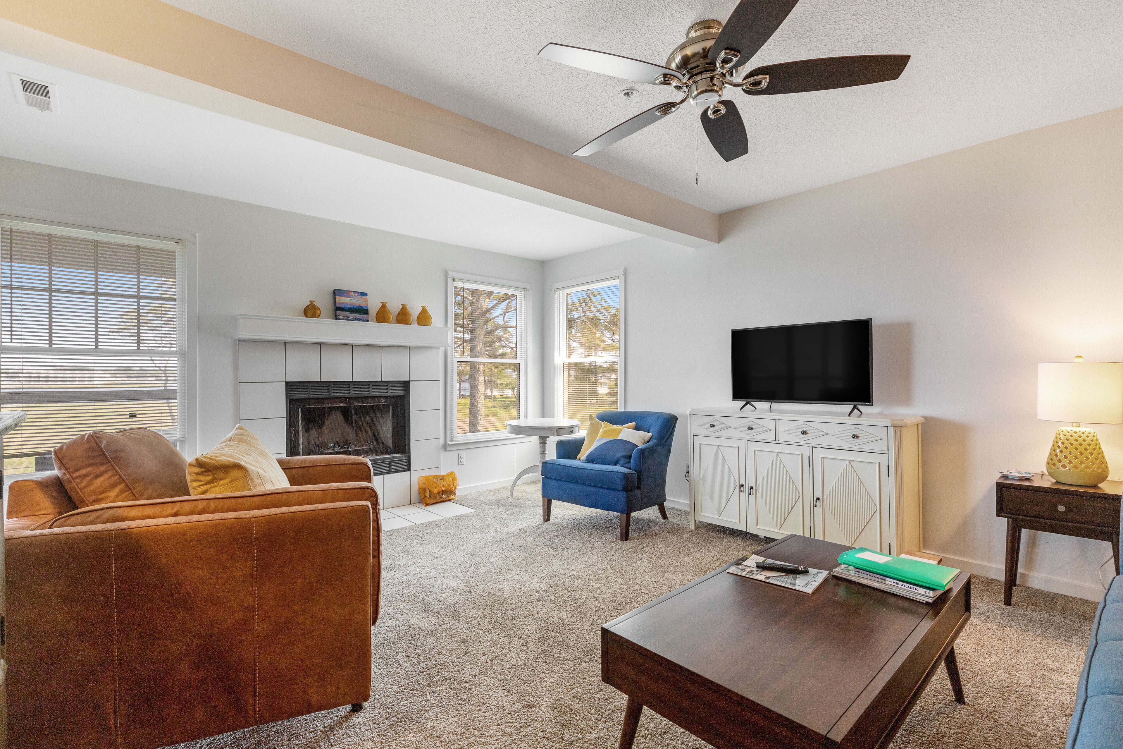 Bay view condo with screened porch, central AC, on-site golf and shared pool