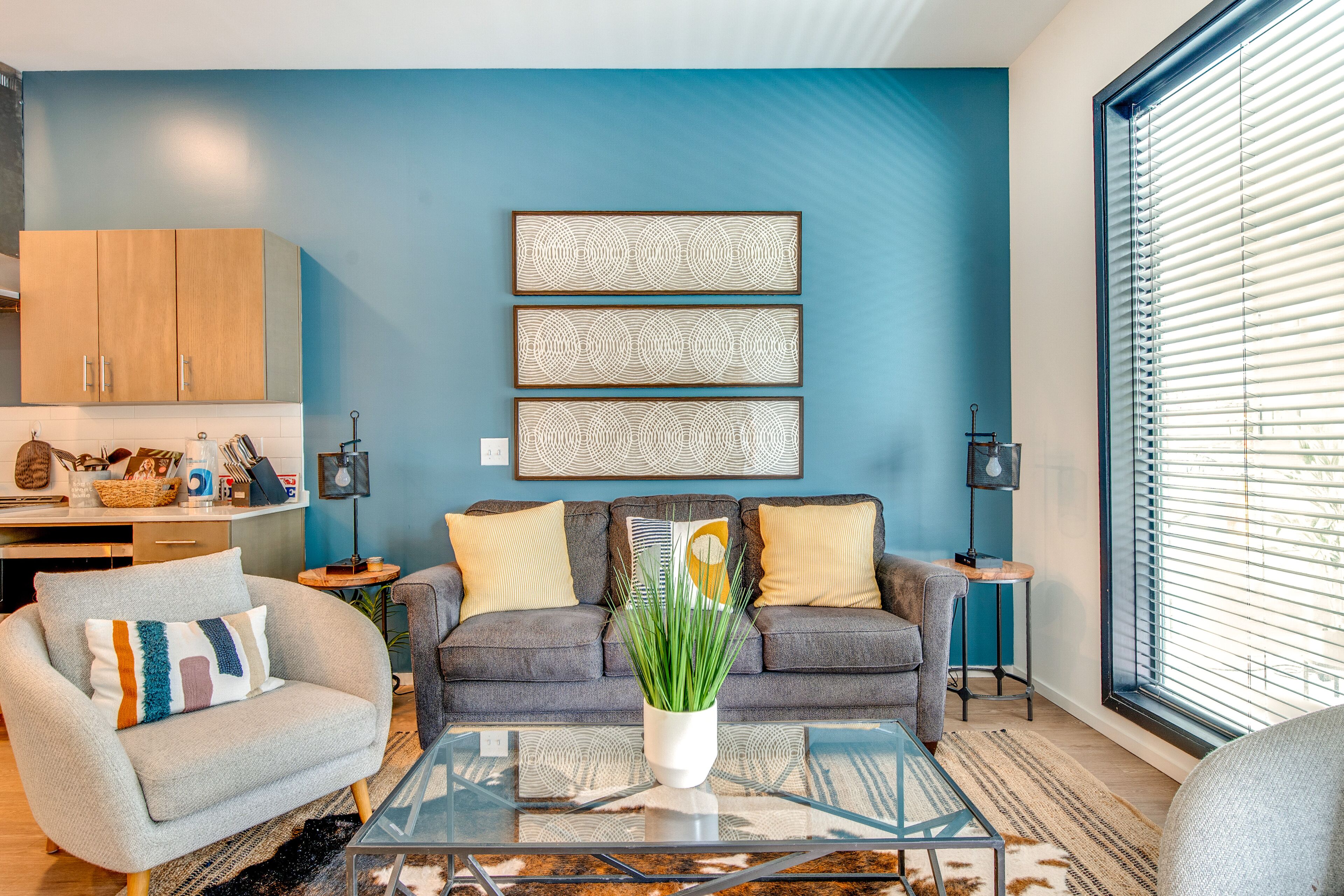 Modern condo near attractions with outdoor pool, balcony, central AC, and WiFi