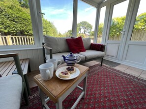 Traditional Cottage | Living area | 50-inch Smart TV with digital channels, TV, fireplace