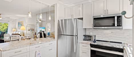 Condo, Multiple Beds | Private kitchen | Fridge, microwave, oven, stovetop