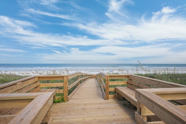 Walk along the boardwalk to the ocean and sandy shore.