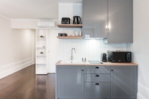 Fridge, microwave, coffee/tea maker, toaster