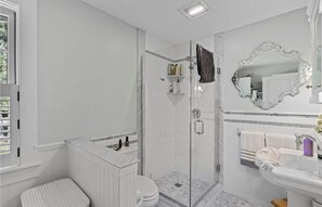 Combined shower/tub, eco-friendly toiletries, hair dryer, towels