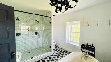 Bathtub, hair dryer, towels, soap