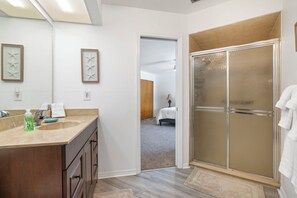 Combined shower/tub, hair dryer, towels, soap