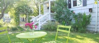 Captain's Cottage, historic cottage on corner lot.