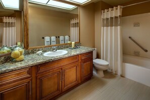 Combined shower/tub, hair dryer, towels, soap