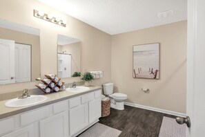 Combined shower/tub, hair dryer, towels, soap