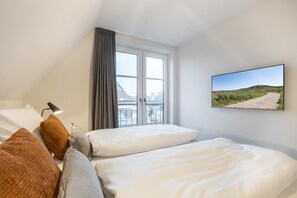 1 Schlafzimmer, Zimmersafe, Schreibtisch, Bügeleisen/Bügelbrett