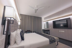 Quarto superior | Frigobar, cofres nos quartos, escrivaninha