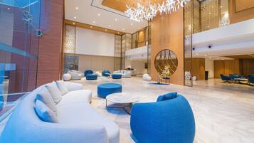 Relax in style with comfortable seating and a unique decorative element.