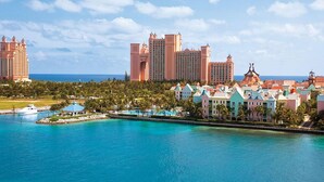 A coastal resort with multiple high-rise buildings, a marina, and a variety of colorful hotel structures. - **ATLANTIS BAHAMAS, PARADISE** - BEAUTIFUL 1 BEDROOM, SLEEPS 4+  (Paradise Island)