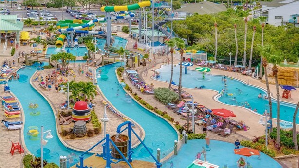 A water park with multiple pools, slides, and a wave pool.