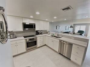 Condo, 2 Bedrooms | Private kitchen | Fridge, stovetop, coffee/tea maker, toaster