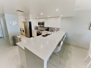 Condo, 2 Bedrooms | Private kitchen | Fridge, stovetop, coffee/tea maker, toaster