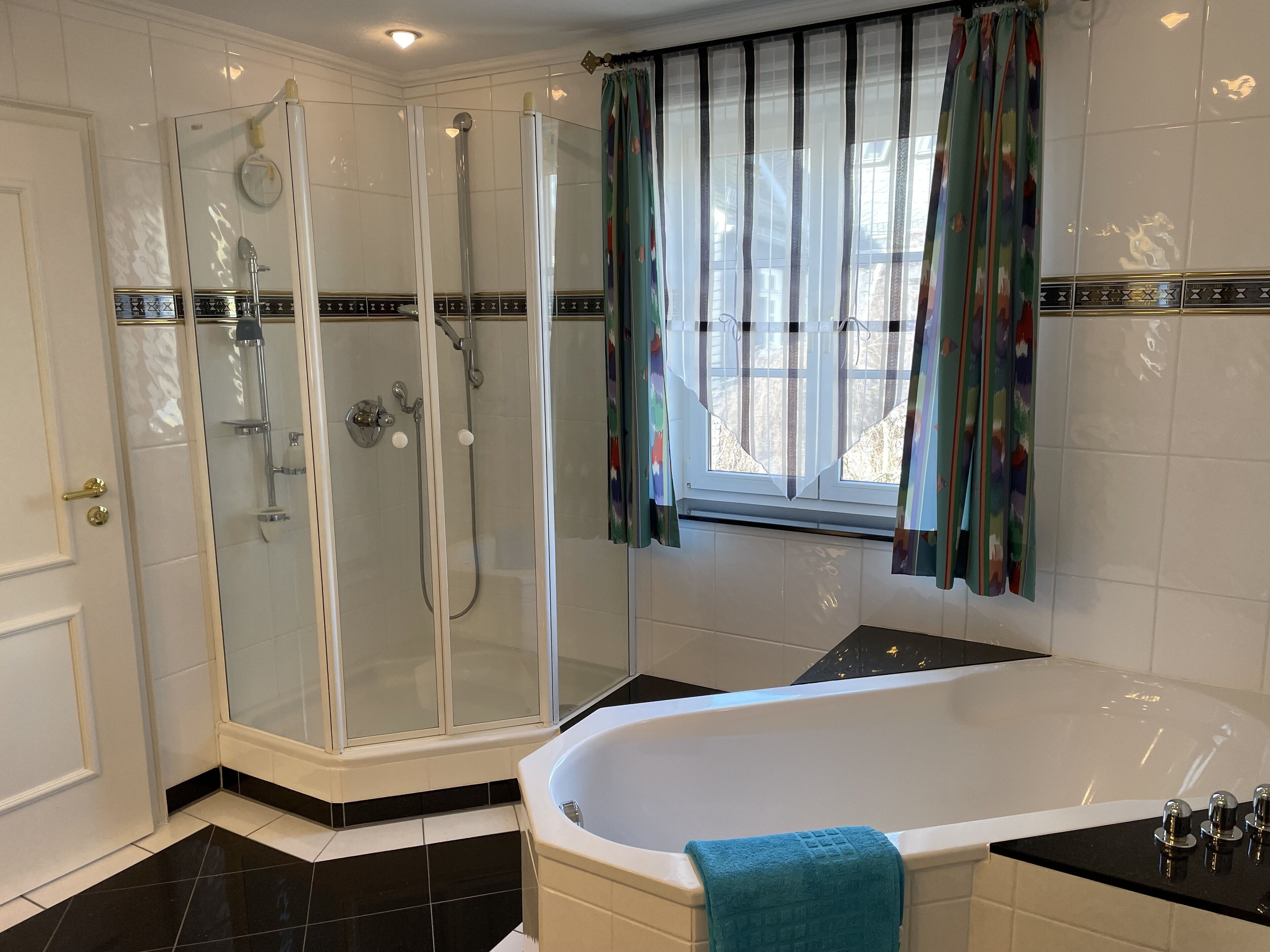Bathtub, hair dryer, towels, soap